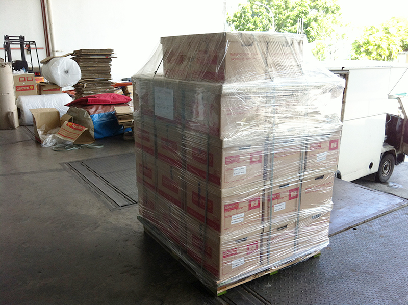 Cartons done lashing and palletizing ready for truck loading.